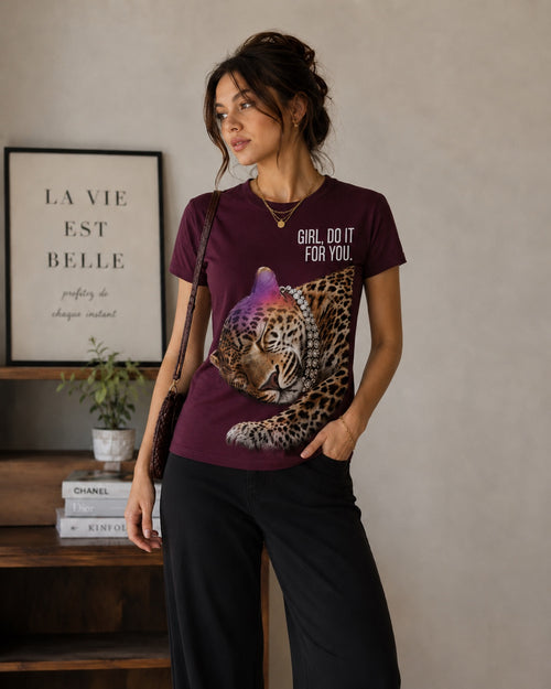 Woman wearing the Queenly Do It For You burgundy regular-fit graphic T-shirt with black pants