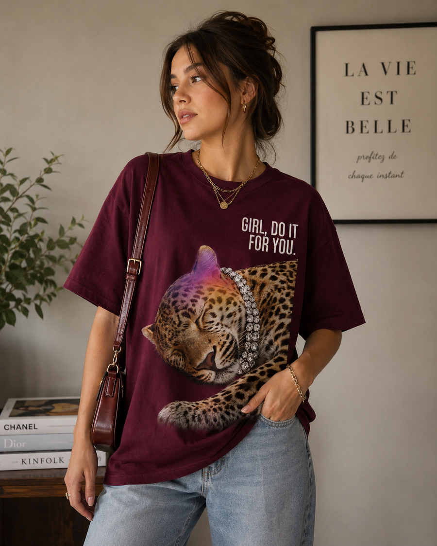 Woman wearing the Queenly Do It For You burgundy leopard graphic T-shirt