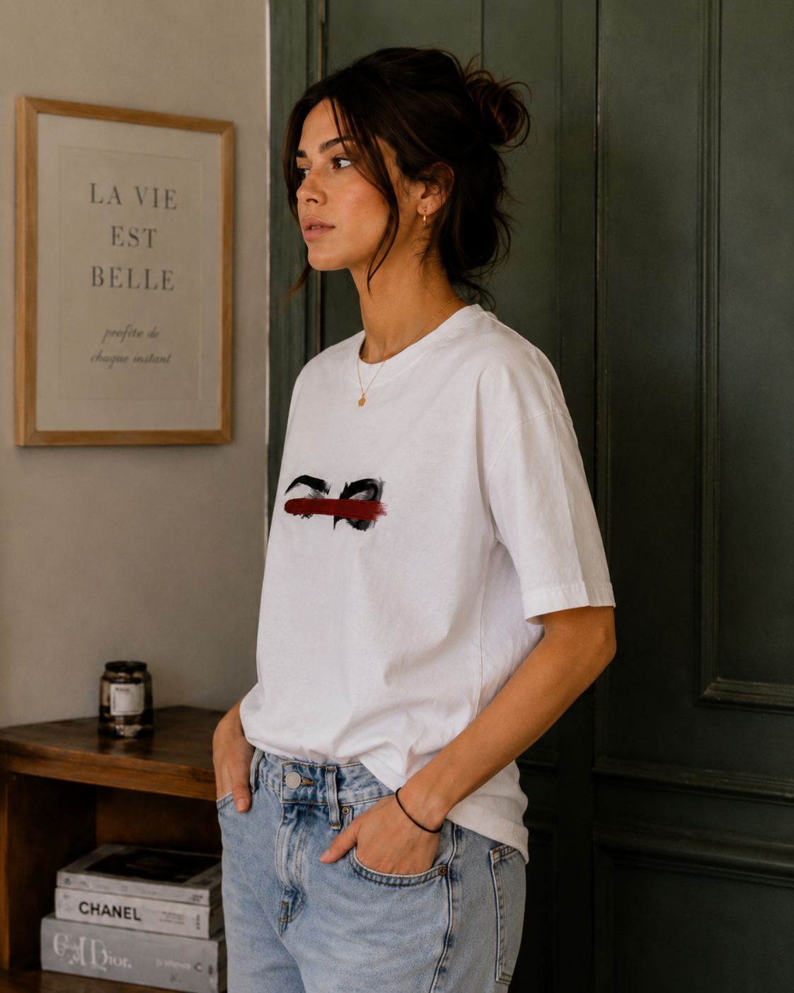 Side angle of model wearing Queenly Eyes Never Lie white regular-fit graphic T-shirt