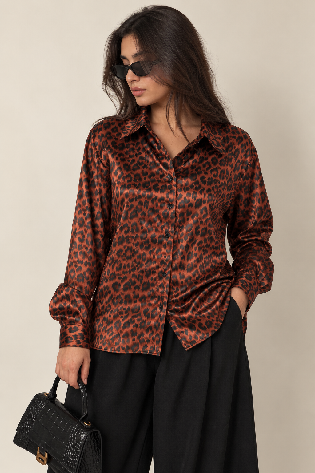 Model wearing leopard satin shirt
