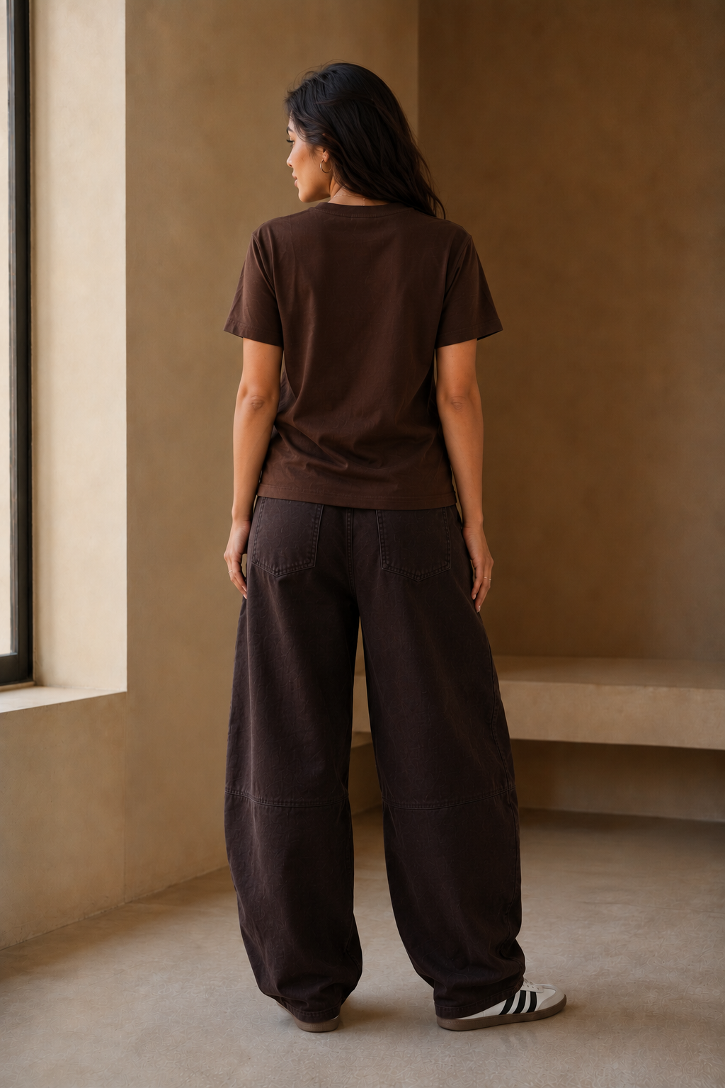 Queenly Varsity 07 brown tee plain back view with dark brown barrel pants